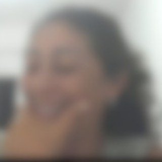 Participante do encontro, rosto desfocado