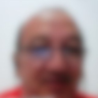 Participante do encontro, rosto desfocado